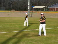 Chandler Blackburn and Dale Deloach work in the outfield during the JV Tigers game. 